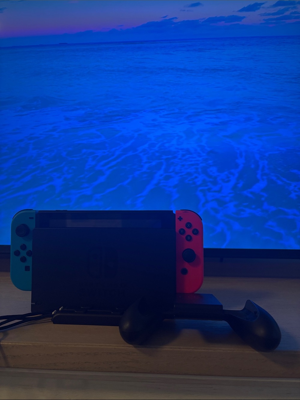 Nintendo Switch with Neon Red and Neon Blue Joy-Con